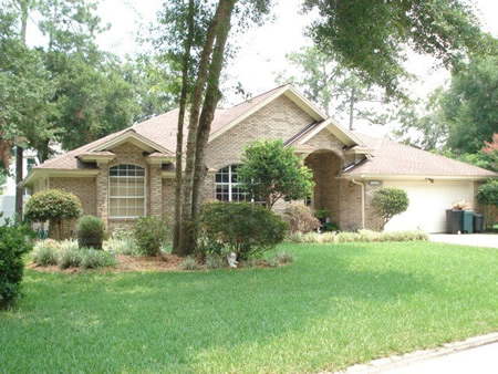Asphalt shingle roof on a jacksonville fl home in bright summer sun